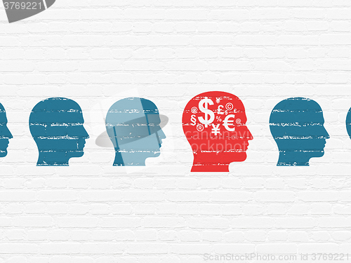 Image of Finance concept: head with finance symbol icon on wall background