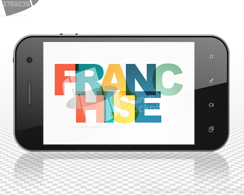 Image of Finance concept: Smartphone with Franchise on  display