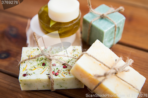 Image of close up of handmade soap bars on wood