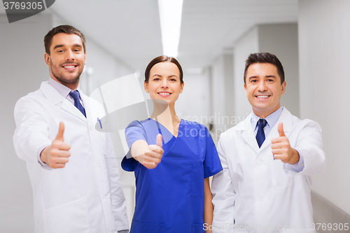 Image of medics or doctors at hospital showing thumbs up