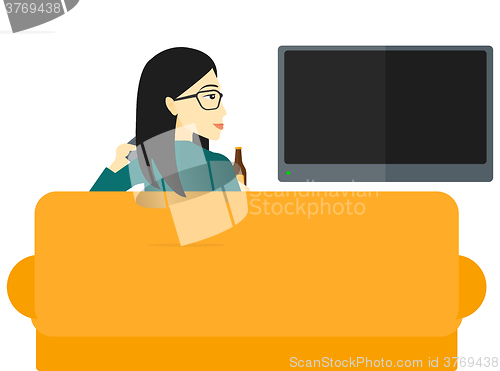 Image of Woman watching TV.