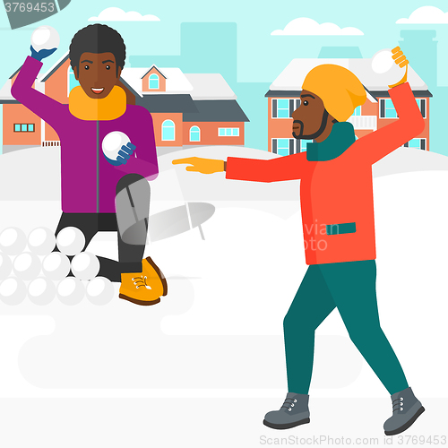 Image of Men playing in snowballs.