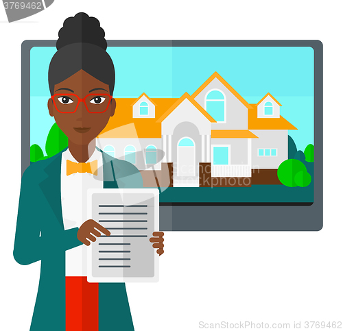 Image of Real estate agent offering house.