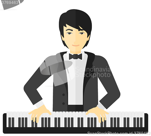 Image of Man playing piano.