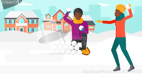 Image of Couple playing in snowballs.