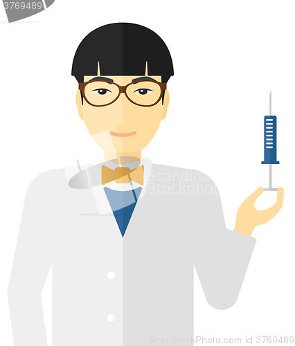 Image of Doctor holding syringe.