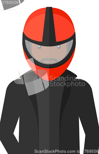 Image of Man in biker helmet.