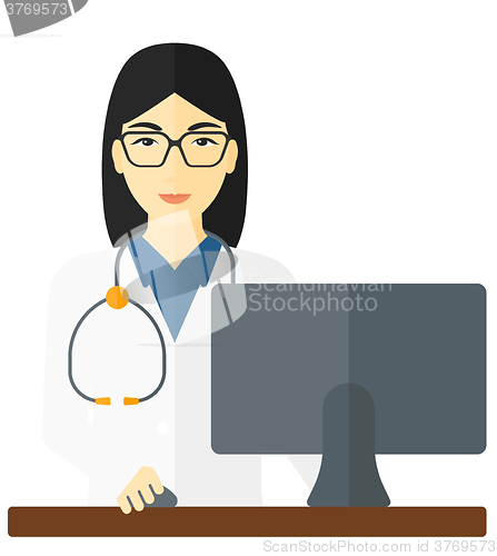 Image of Pharmacist standing at counter.