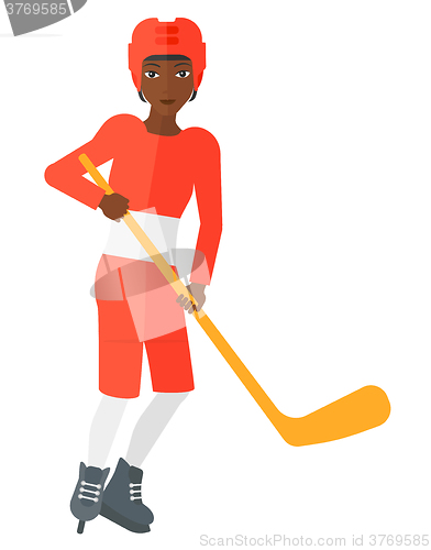 Image of Ice-hockey player with stick.