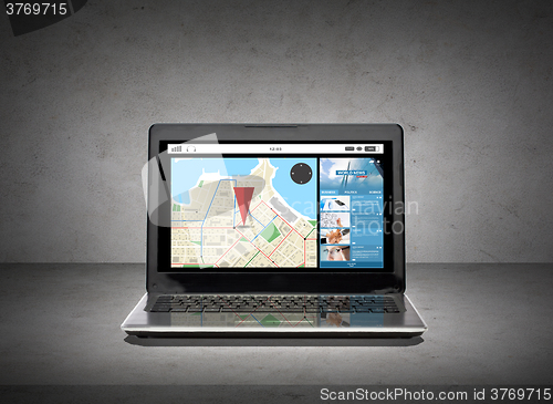 Image of laptop computer with gps navigator map on screen