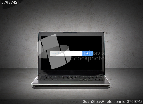 Image of laptop with internet browser search bar on screen