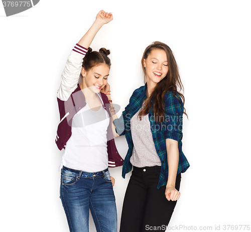 Image of happy smiling pretty teenage girls dancing