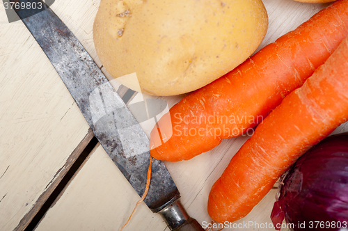 Image of basic vegetable ingredients carrot potato onion 
