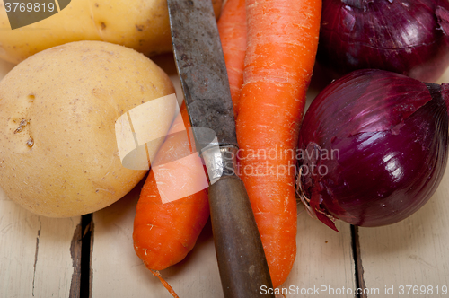 Image of basic vegetable ingredients carrot potato onion 