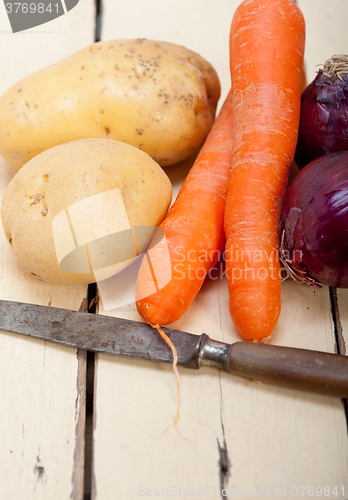 Image of basic vegetable ingredients carrot potato onion 