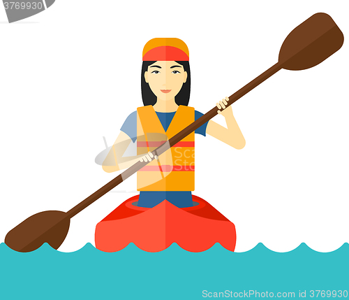 Image of Woman riding in canoe.