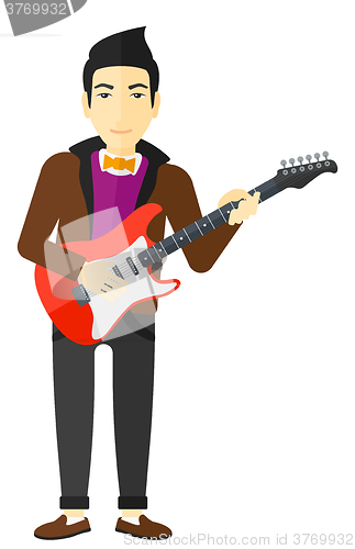 Image of Musician playing electric guitar.