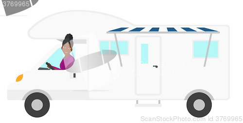 Image of Woman driving motor home.