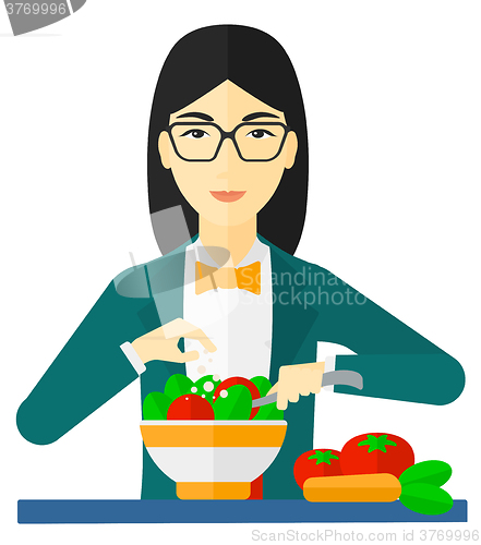 Image of Woman cooking meal.