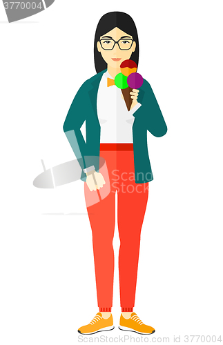 Image of Woman holding icecream.