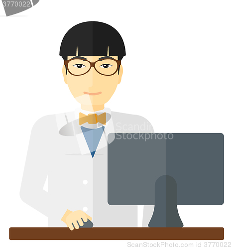 Image of Pharmacist standing at counter.