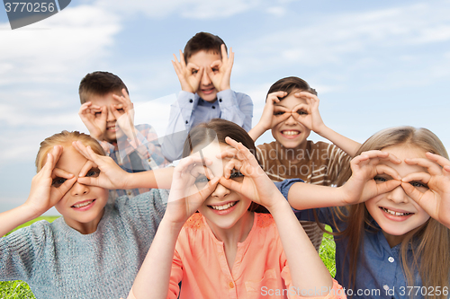 Image of happy children making faces and having fun