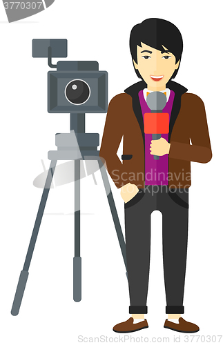 Image of TV reporter working.