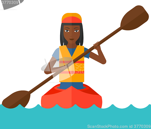 Image of Woman riding in canoe.