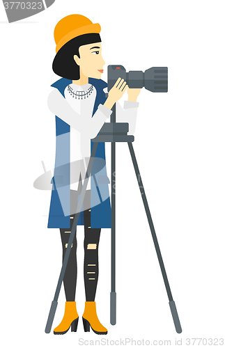 Image of Photographer working with camera.