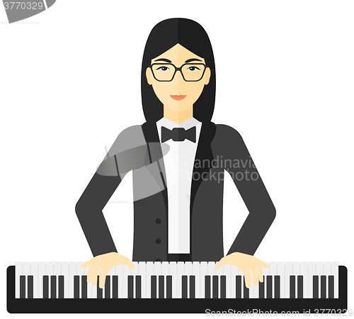 Image of Woman playing piano.