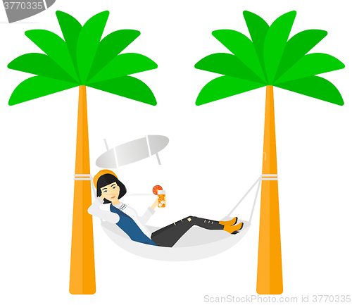 Image of Woman chilling in hammock.