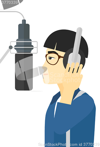 Image of Singer making record. 