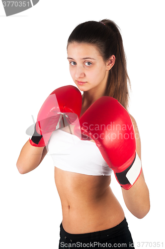 Image of Beautiful woman working out with boxing gloves