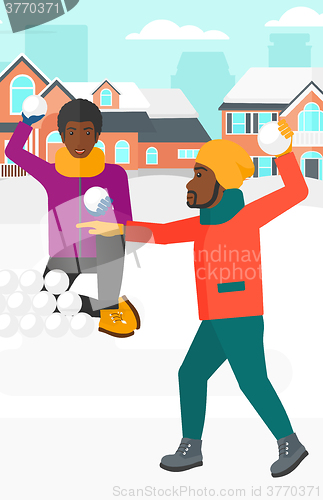 Image of Men playing in snowballs.