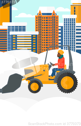 Image of Man plowing snow.