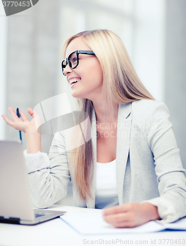 Image of businesswoman with documents