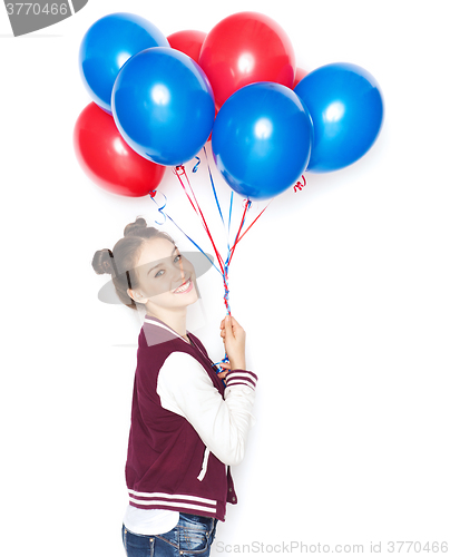 Image of happy teenage girl with helium balloons