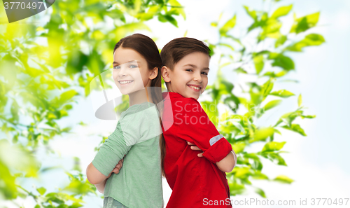 Image of happy boy and girl standing together
