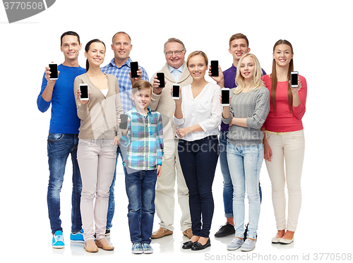 Image of group of smiling people with smartphones