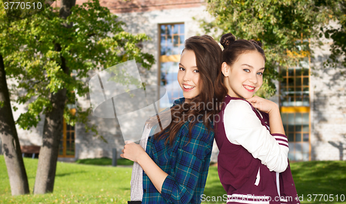 Image of happy smiling pretty teenage girls over campus 