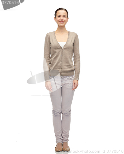 Image of smiling young woman in cardigan