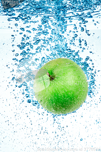 Image of Green Apple in the Water.