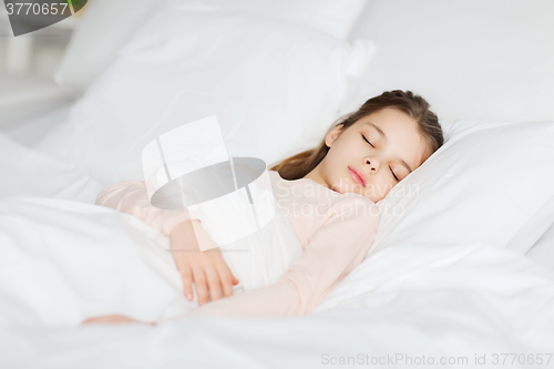 Image of girl sleeping in bed at home