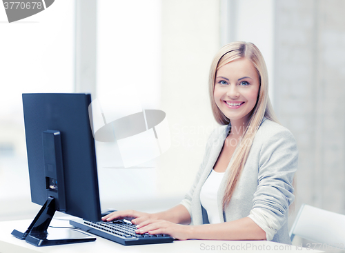 Image of businesswoman with computer