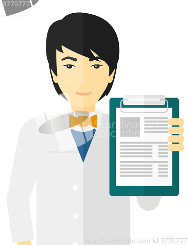 Image of Doctor holding medical notepad.