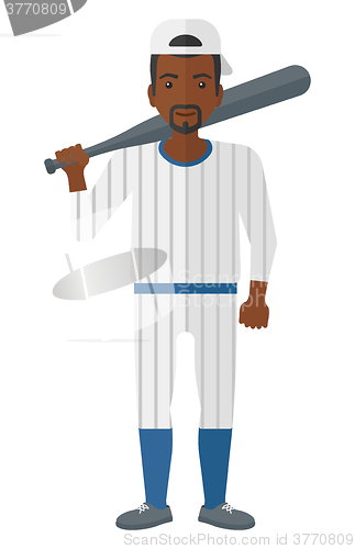 Image of Baseball player standing with bat.
