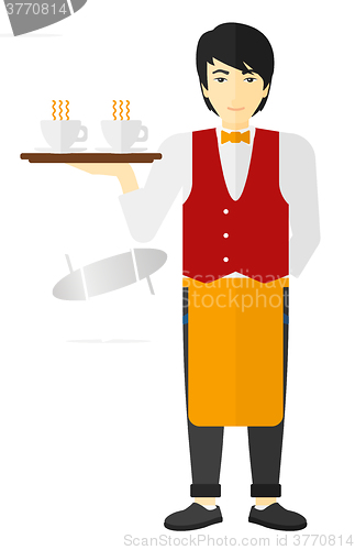 Image of Waiter holding tray with beverages.