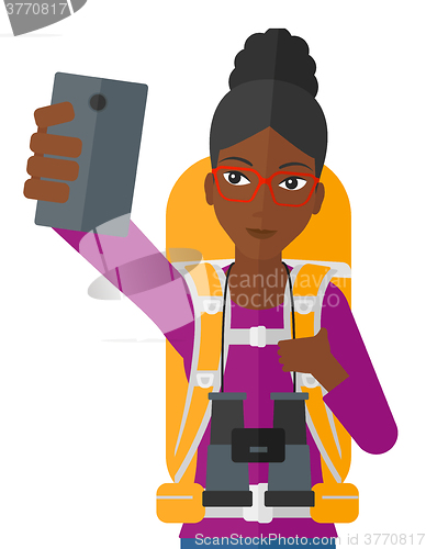 Image of Woman making selfie.