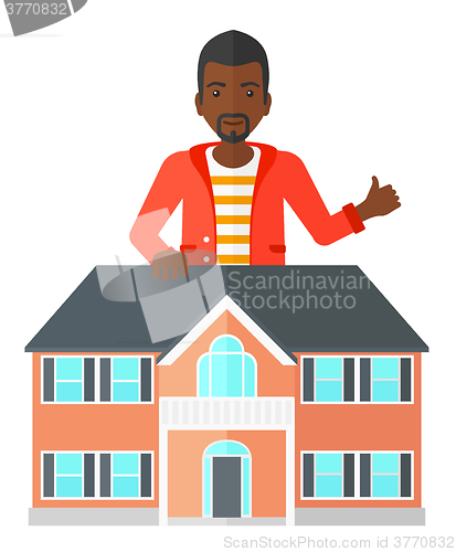 Image of Real estate agent showing thumb up.
