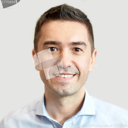 Image of smiling businessman face or portrait